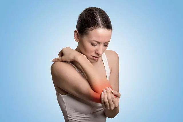 Woman with elbow pain