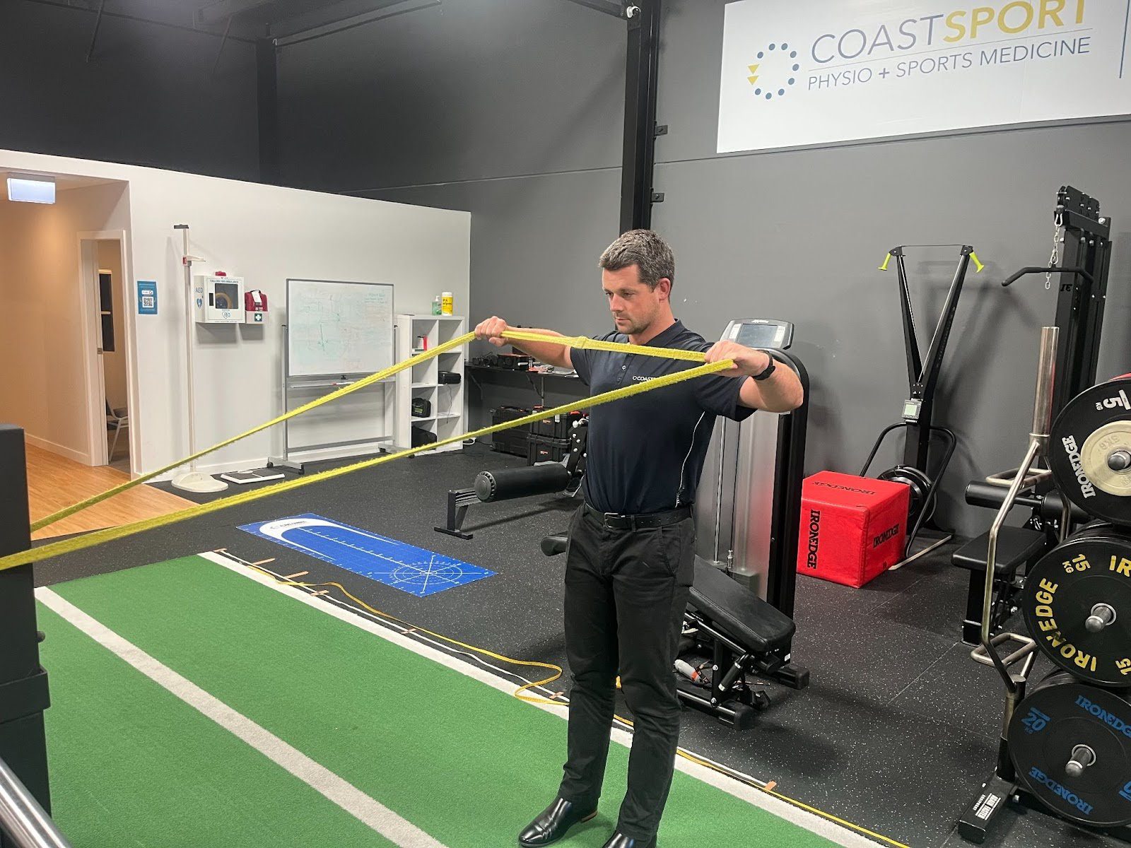 Resistance band chest-level rotation exercise focusing on core stability and shoulder control