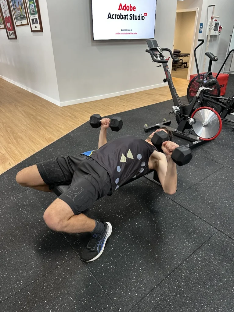 Dumbbell floor press as a shoulder pain chest press alternative