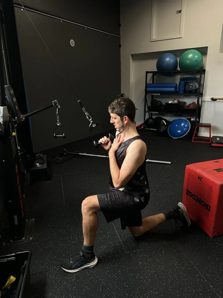 Half kneeling cable exercise for rotator cuff stability